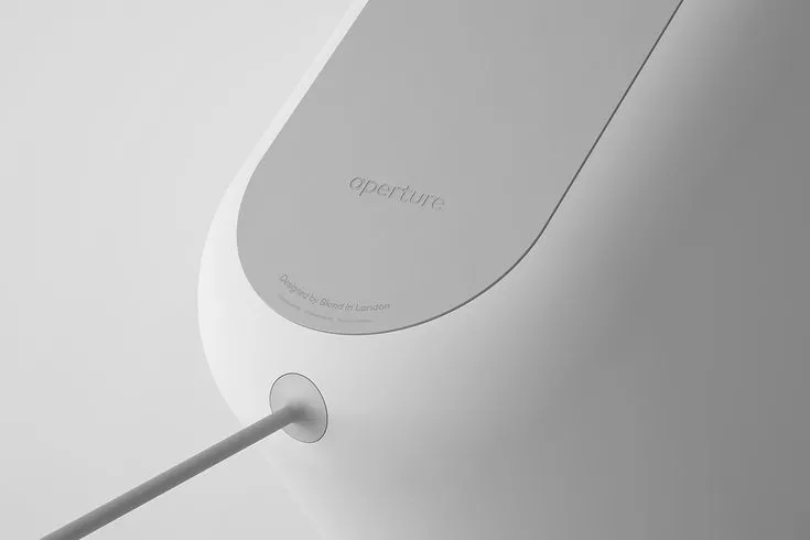 the back end of an electronic device that is white and has a