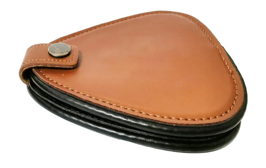 Design Problem, or User Behavior Problem? Guitar Pick Storage - Core77