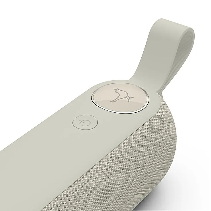 an electronic device is shown on a white surface with the le